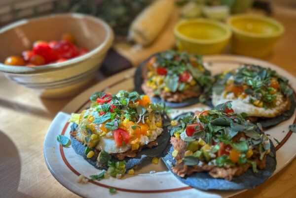 Purslane Tostadas with fried eggs and fresh garnish